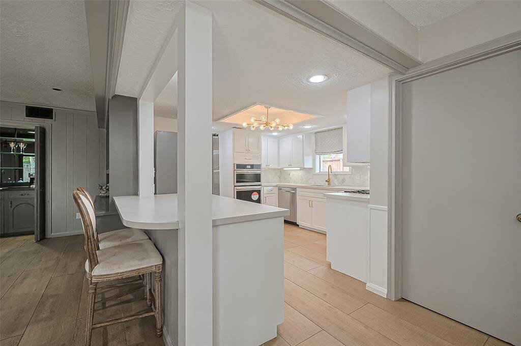 Off the kitchen is a breakfast room.