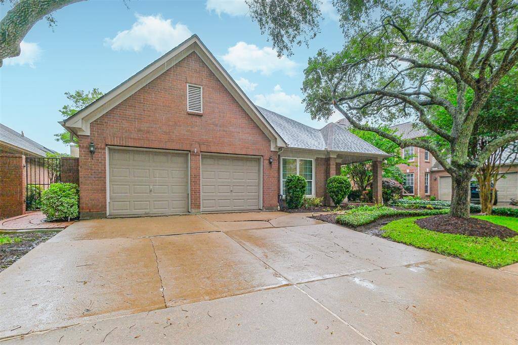 two car garage and outside entry to the backyard and patio.