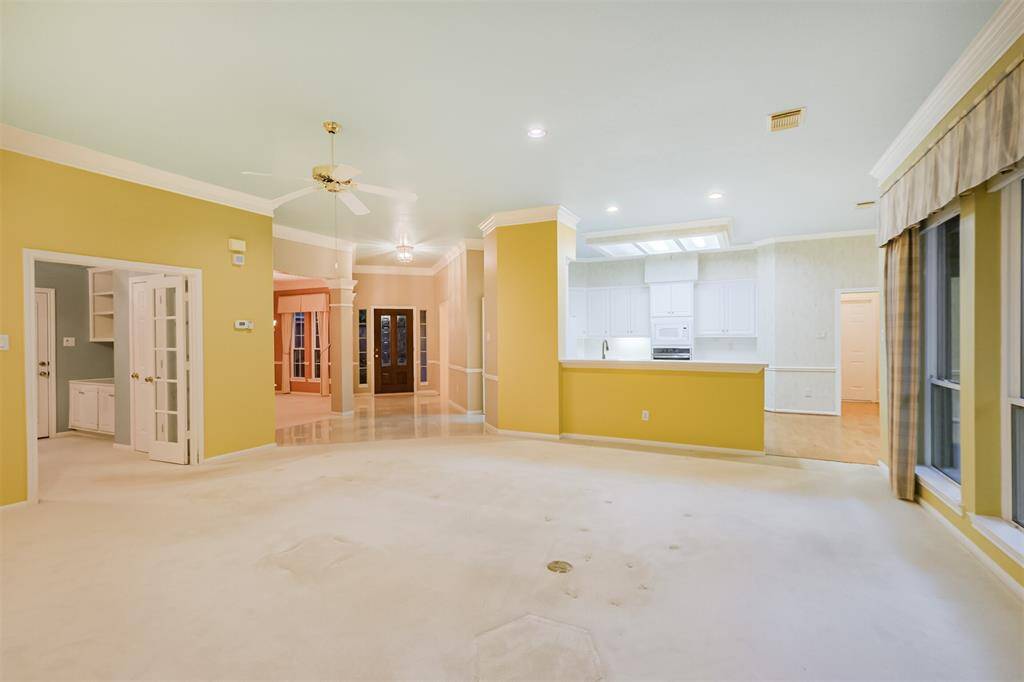 Spacious Living area opening to study and kitchen area