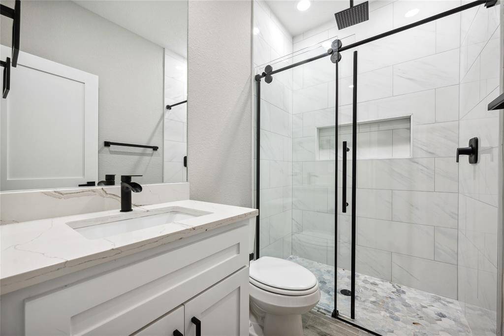 Guest bath with spacious shower.