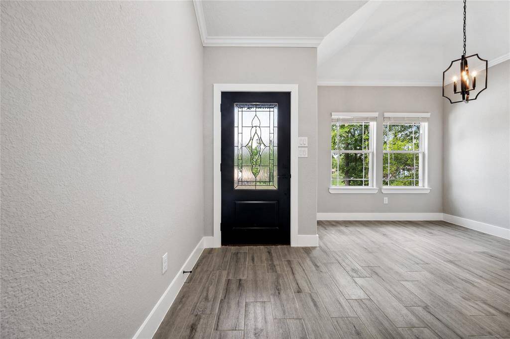 Foyer opens to the dining room.