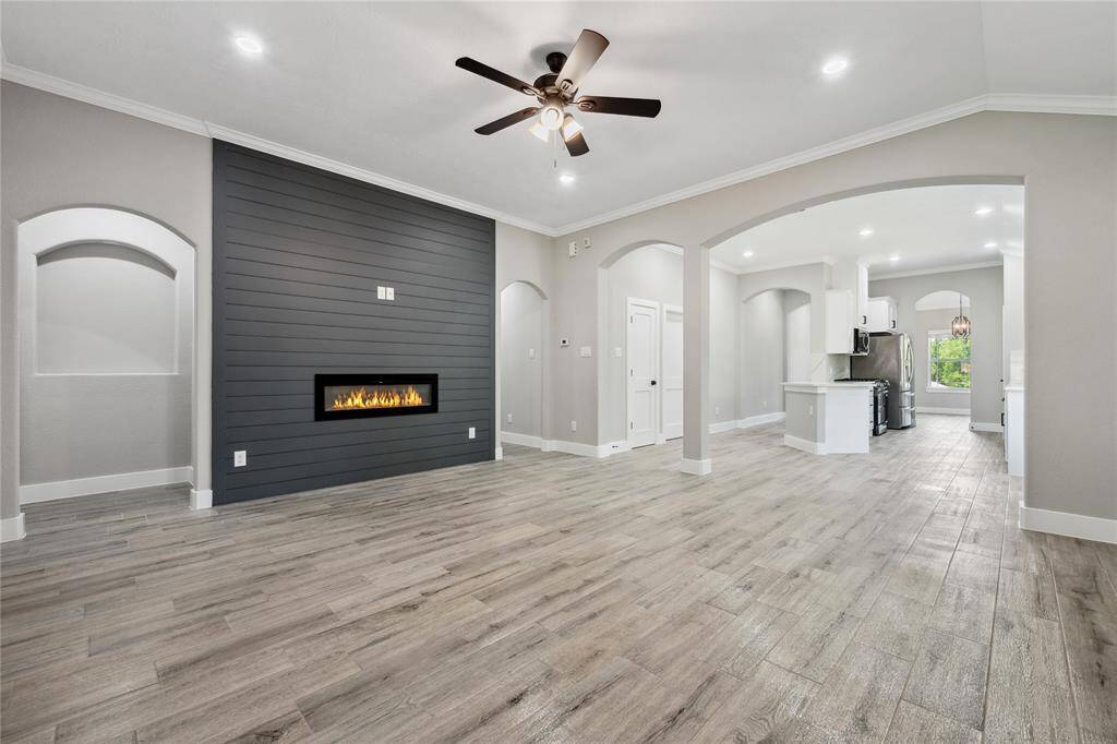 Living room is open to breakfast room and kitchen. Great flow for ease of entertaining.
