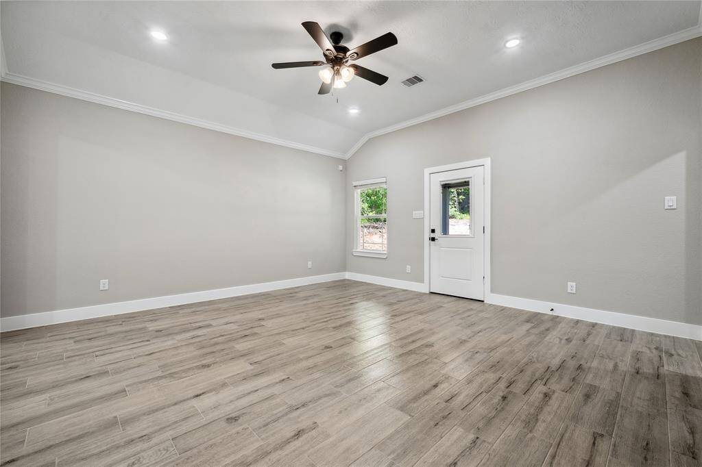 Door leads to covered porch just off the living room.