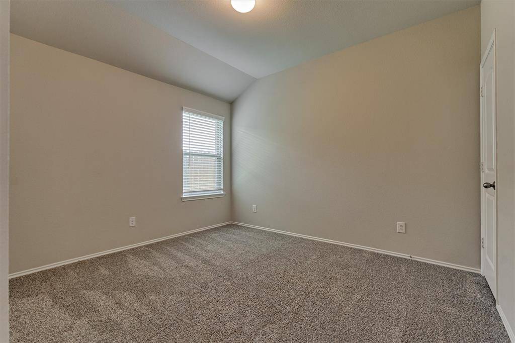 All secondary bedrooms have walk-in closets and neutral carpeting.