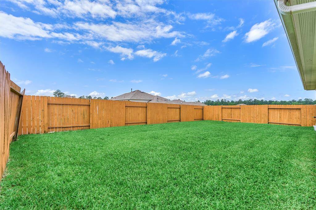 The in-ground irrigation system covers the front and back yards.
