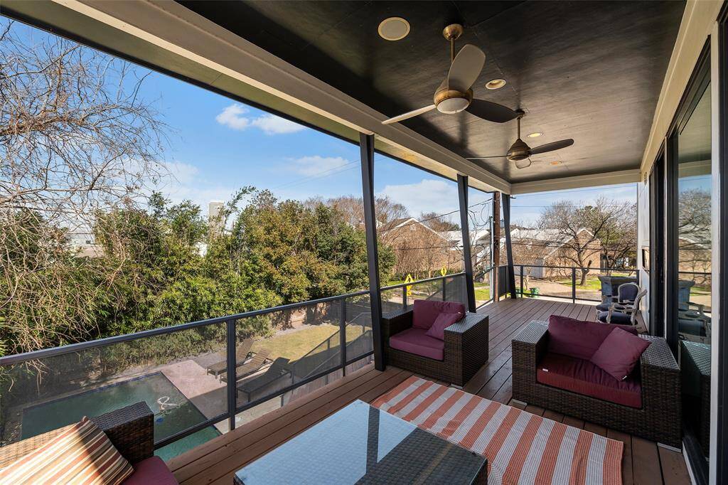 This photo showcases the ample space on the balcony. Perfect for relaxation and outdoor entertaining with the outdoor sound system!