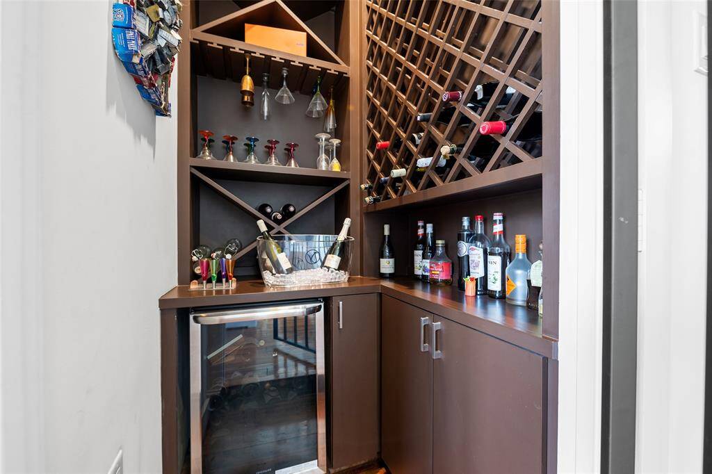 This bar area has everything you need for entertaining! A home elevator can be added as this is actually an elevator shaft!