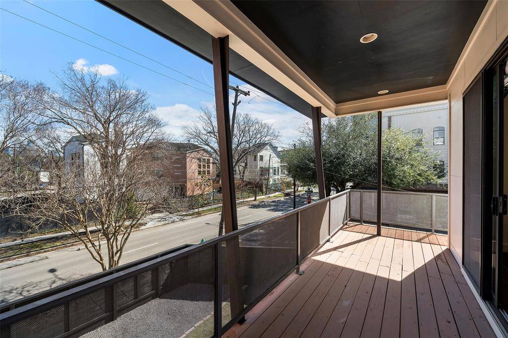 Here we have another balcony on the second floor that wraps around the side and front.