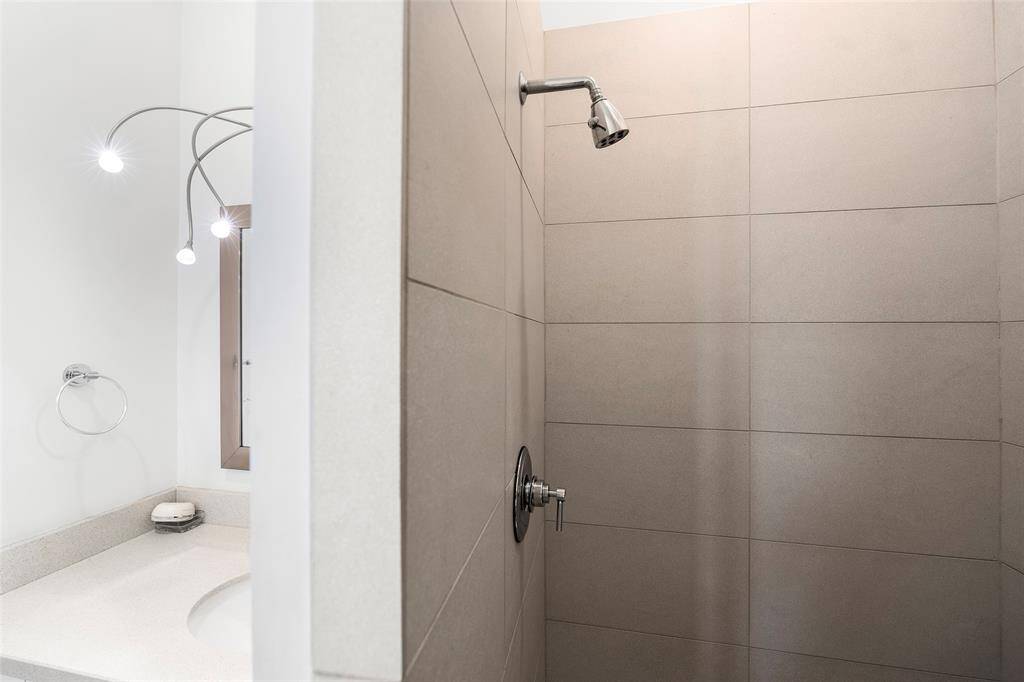 Full bathroom located on the second floor shared by two bedrooms.
