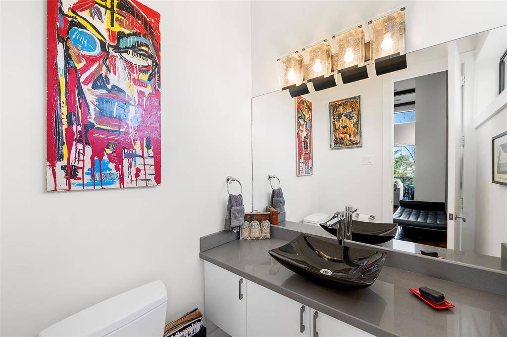 Luxurious powder room located on the second floor.