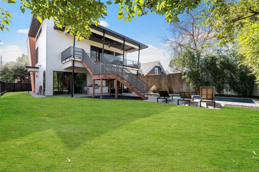 Exterior view of this exceptional oversized corner lot in Montrose with a pool!