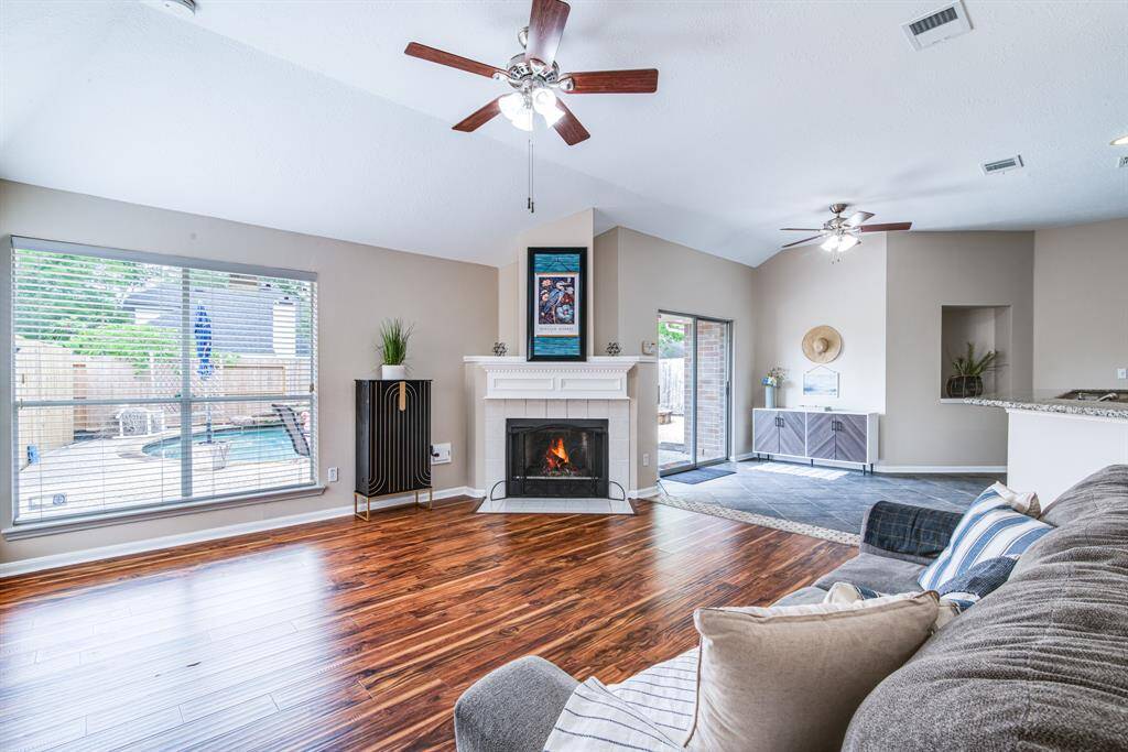 Great view of the pool from the family room.  Connected to breakfast room and kitche.