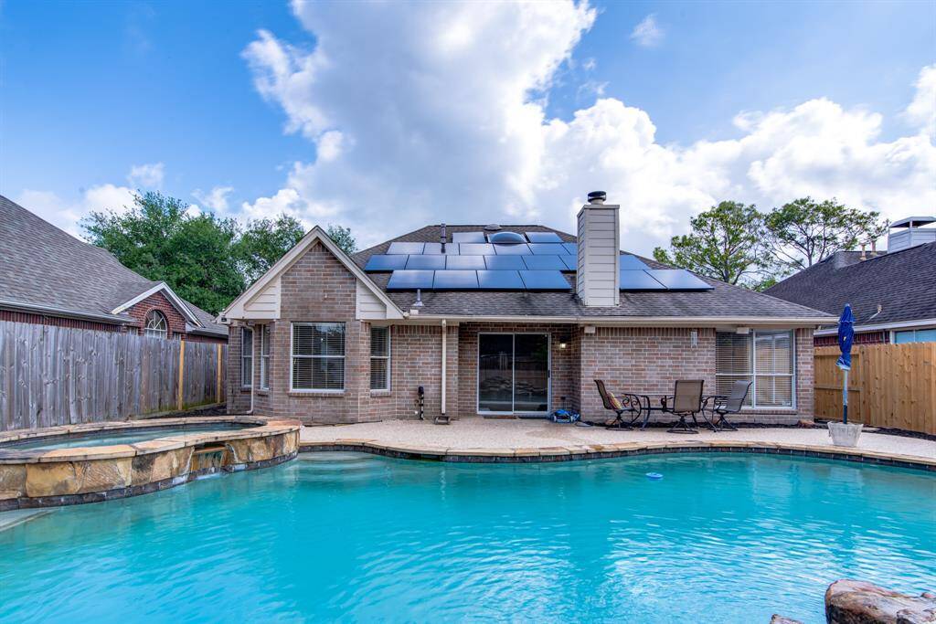 Amazing pool to accommodate all your friends and family.  Notice the solar panels installed in 2024.  Efficient way to save on electricity.