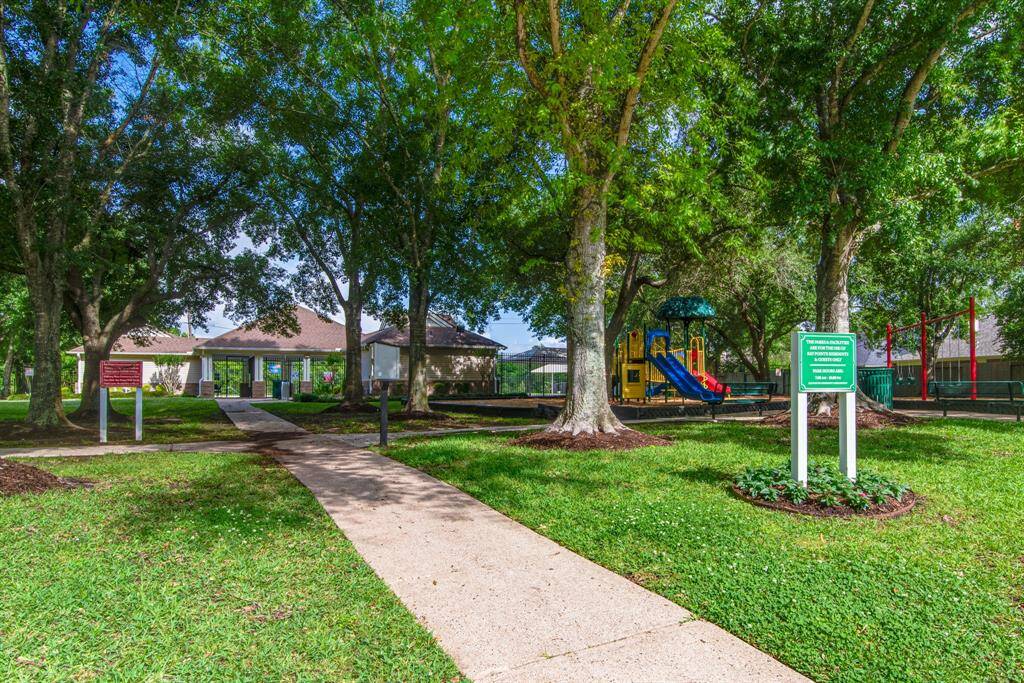 Pay Pointe park.  Payground and pool.  Beautiful trees to shades the area.