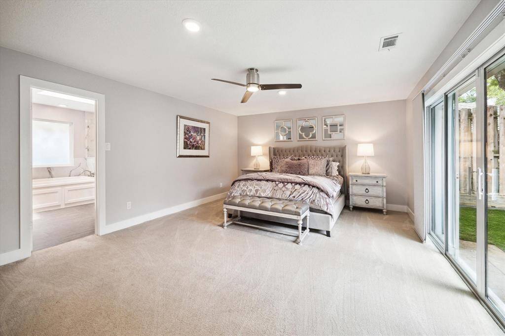 The primary bedroom includes a private ensuite bath, creating a true retreat.
