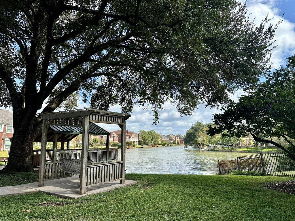 The lake in Hall Lake subdivision connects with Oyster Creek waterway.
