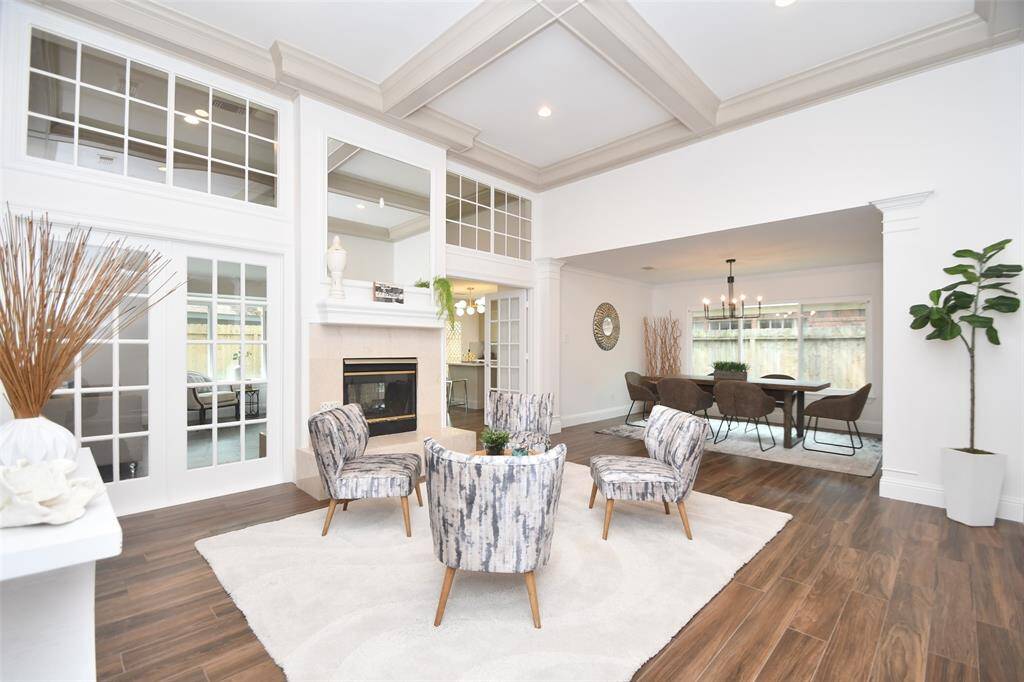 High Coffered Ceilings add to the Drama of this of this beautifully remodeled Single Story home
