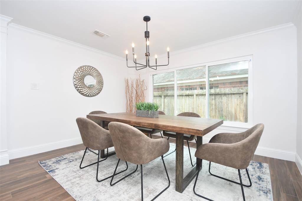 Divine dining room large enough to host gathering both big and small.