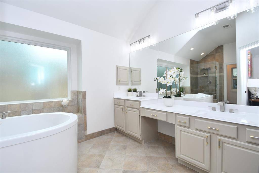 Relax in your spacious updated Spa-Like Bathroom