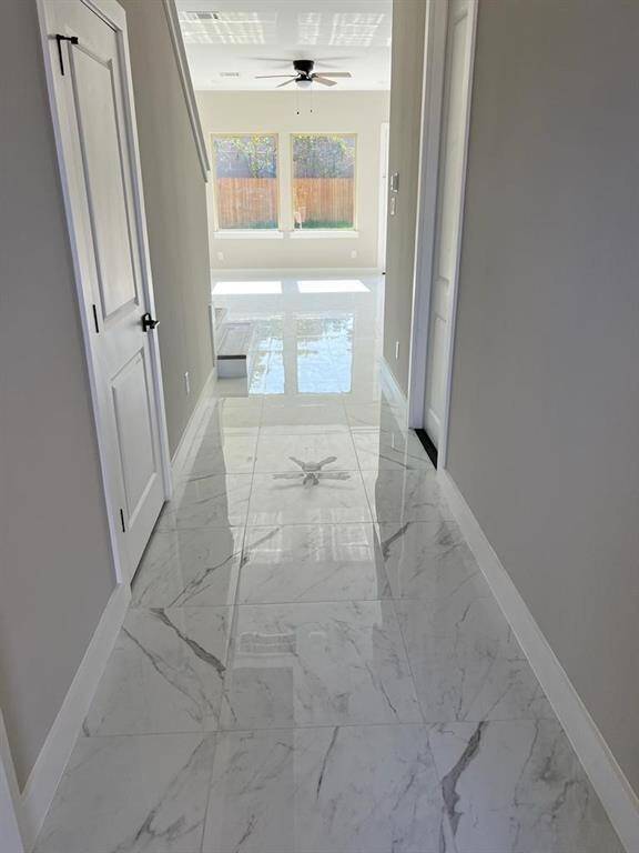 Guest by High Ceiling and Open Floor Leaving Space