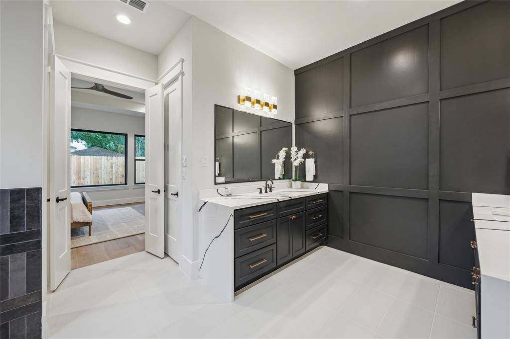 "His" vanity and accent wall.