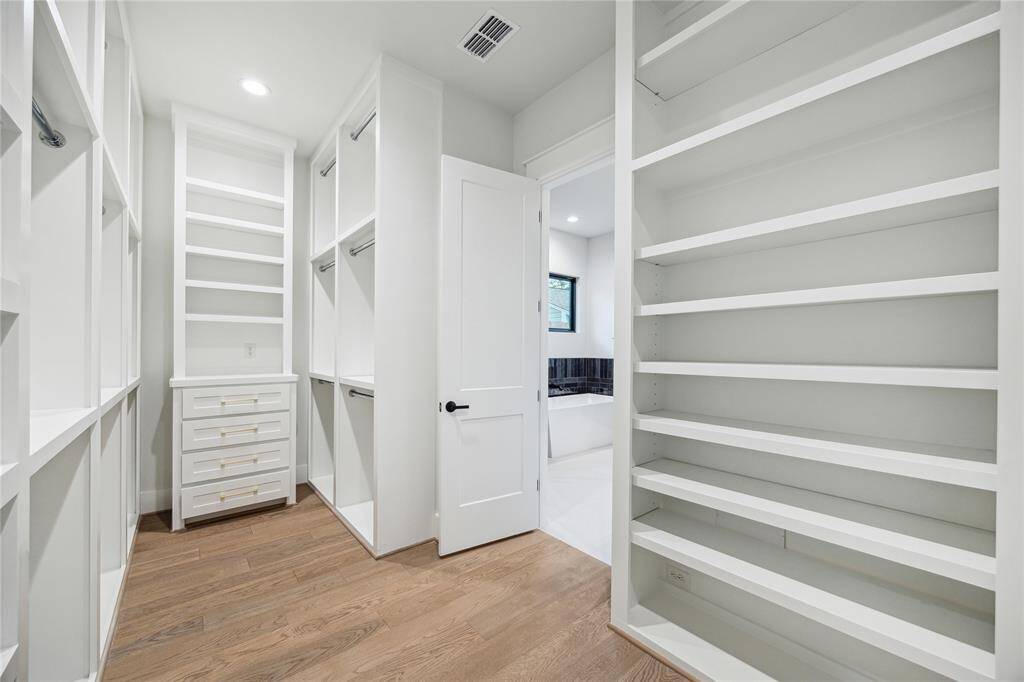 Alternate view of the primary closet.