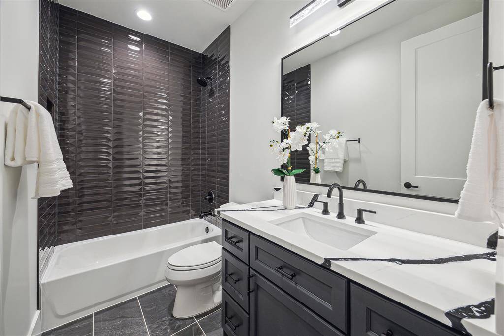 Off of the loft, this beautiful secondary bathroom.
