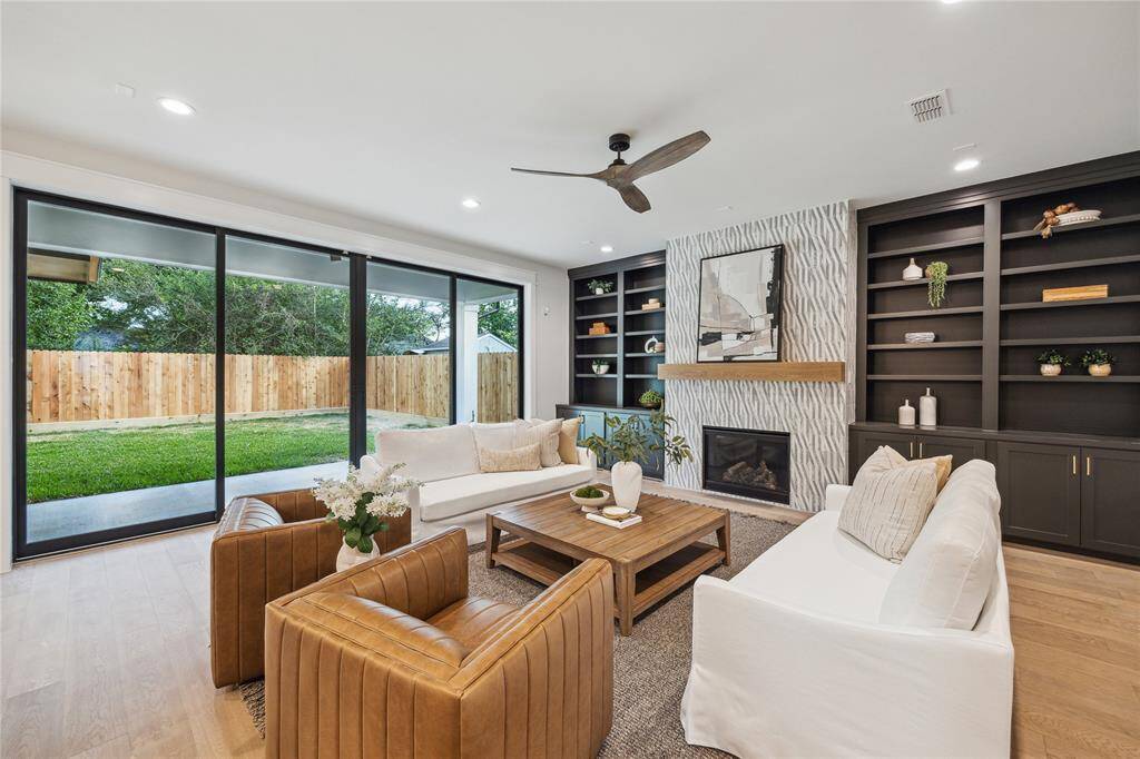 The great room is 20'x20'8" which is perfect for entertaining! 9' tall sliding window wall leads to the back porch.