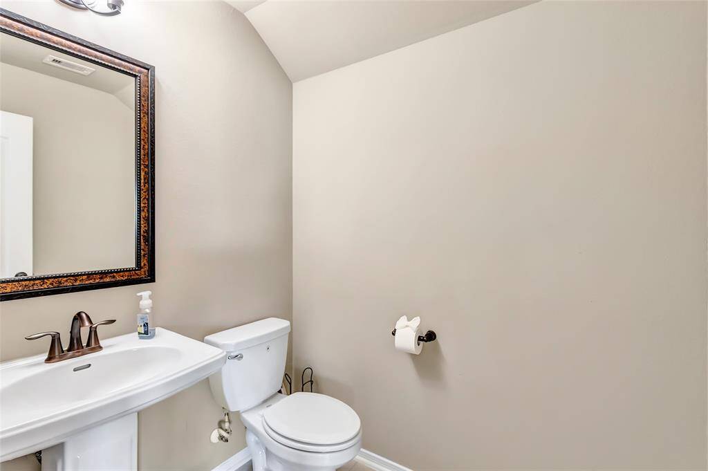 Half bathroom upstairs in flex room.