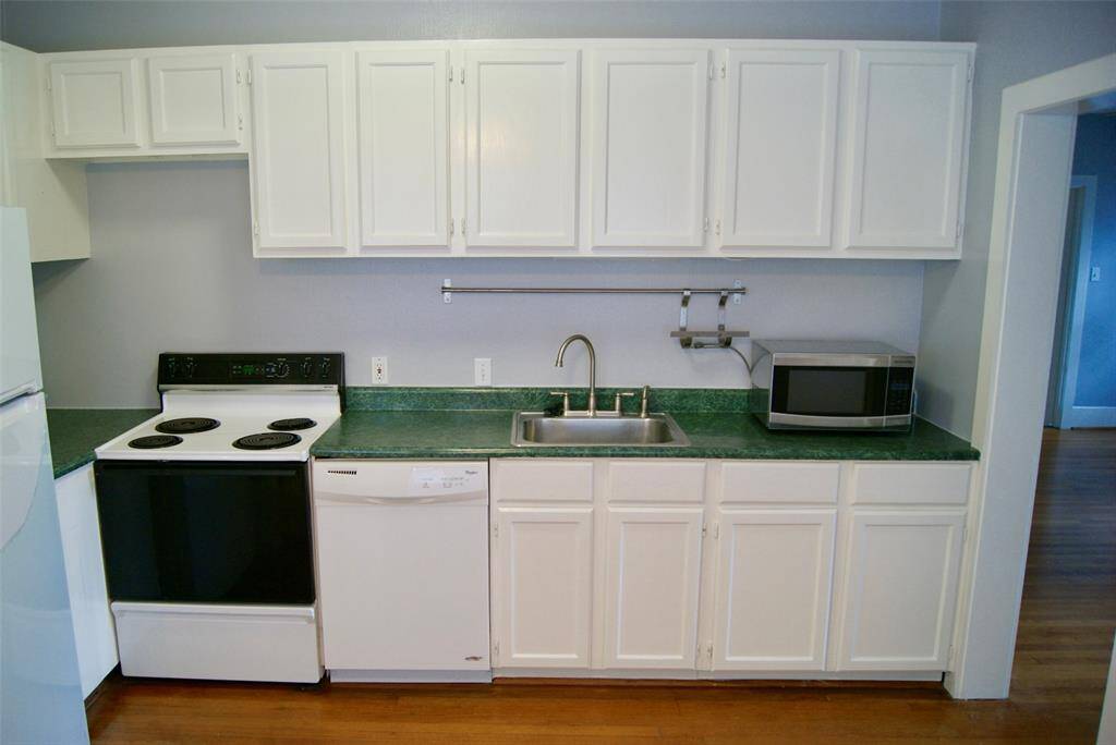 Big, eat-in kitchen with hardwood floors.  Refrigerator, microwave, stacked washer and dryer included in lease.