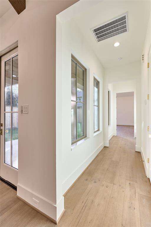 Leading into the spacious primary suite.