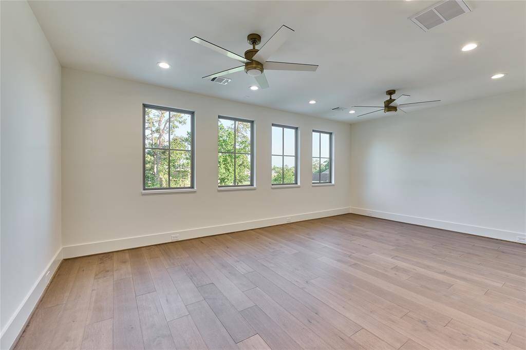 This game room area is perfect for family fun or as an ideal play area, offering plenty of space for entertainment and activities.