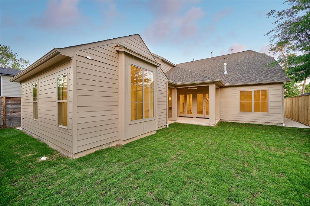 The backyard offers ample room to add a pool-making it your perfect outdoor retreat!