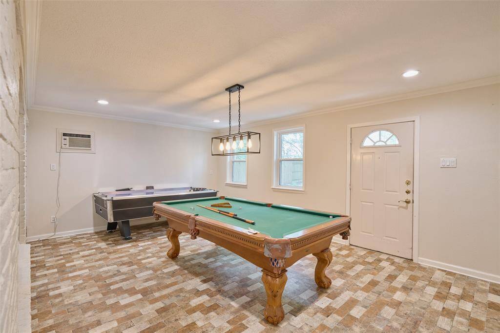 Gameroom has a pool table and an air hockey table that can stay.