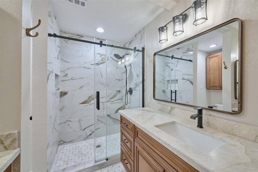 Gorgeous walk in shower in updated primary bath