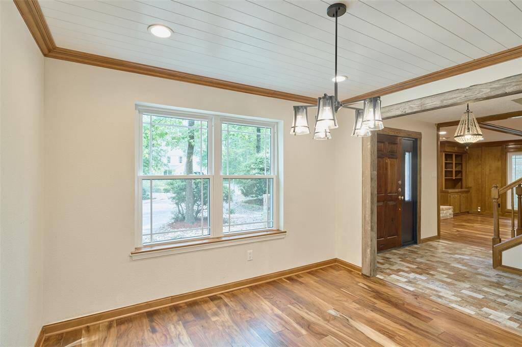 Did you notice the lovely brick floor at entry and gorgeous flooring throughout?