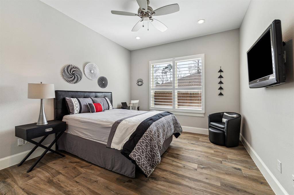 The second bedroom on the first floor includes a closet with custom built-ins.