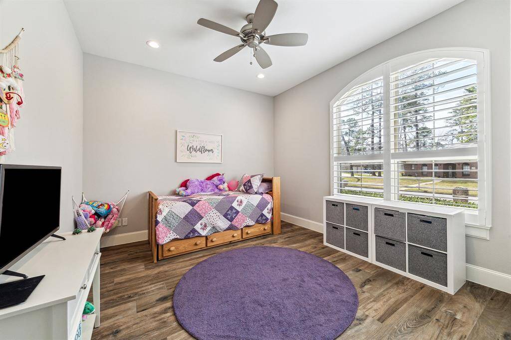 The third bedroom on th first floor has a walk-in closet and ample lighting.