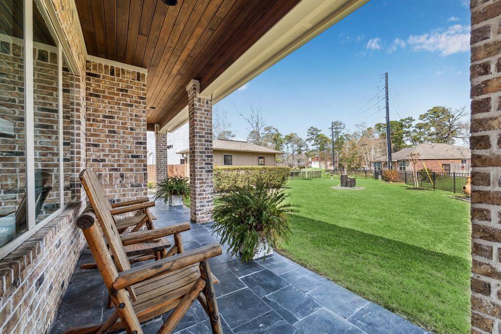 Stuning backyard with covered patio and golf corse views.