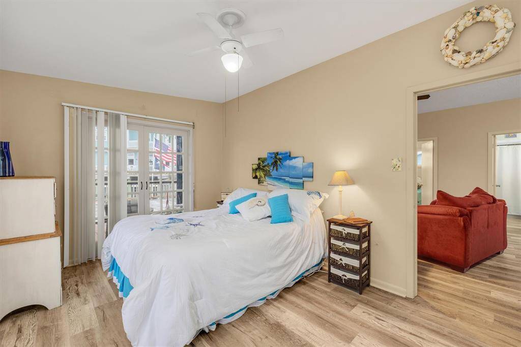 Large main bedroom with french doors to catch tha gulf breeze.