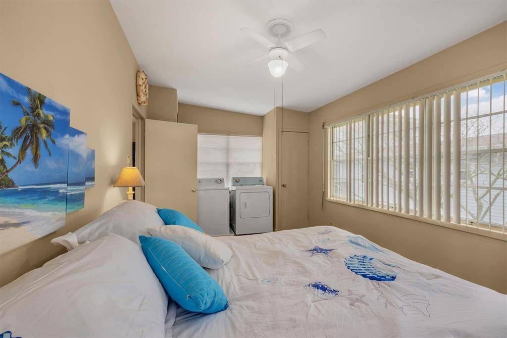 Washer and dryer nook in the main bedroom for quick and easy clean up.