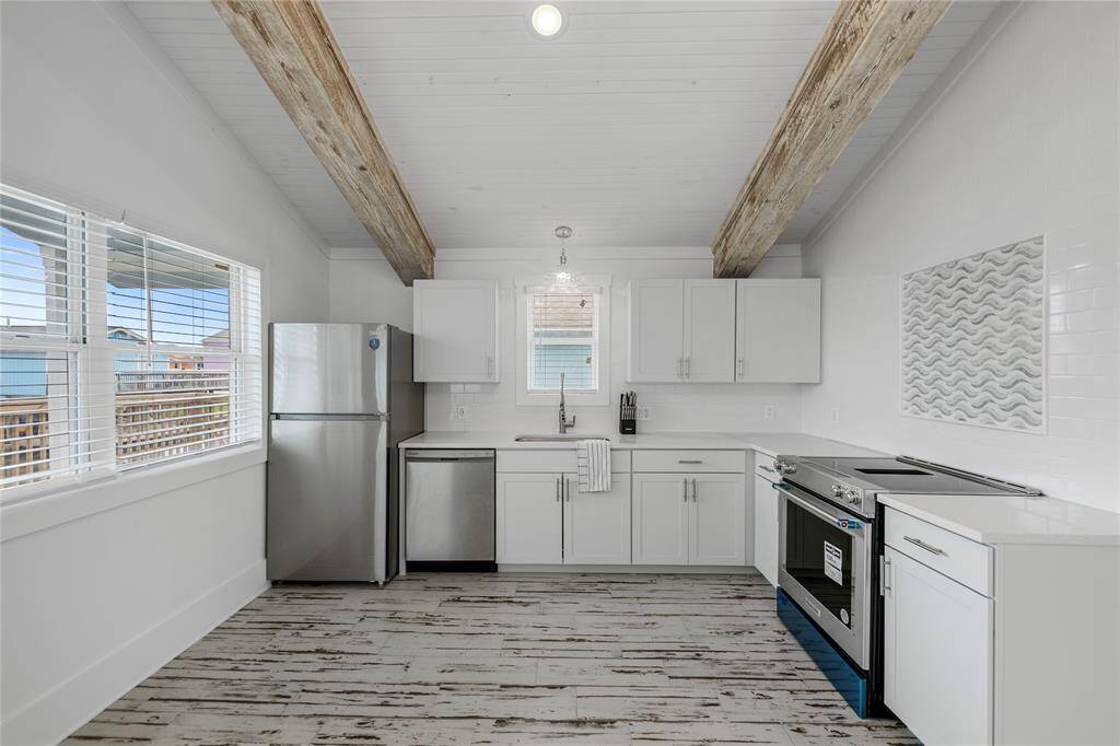Tasteful rustic flooring and ceiling.