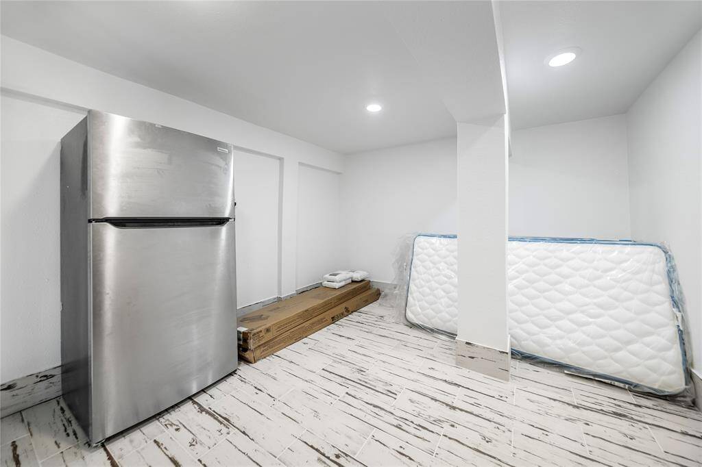 This enclosed room on the ground level is spacious enough for two level bunk beds