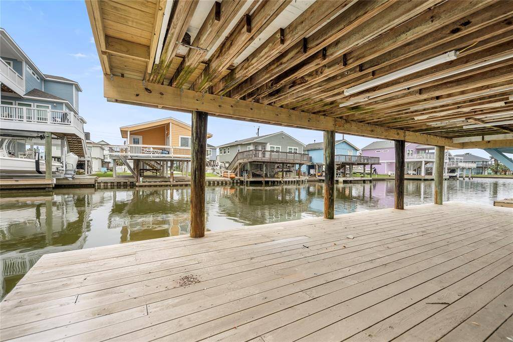 Ariel view of the bay home, waterfront living at your feet.