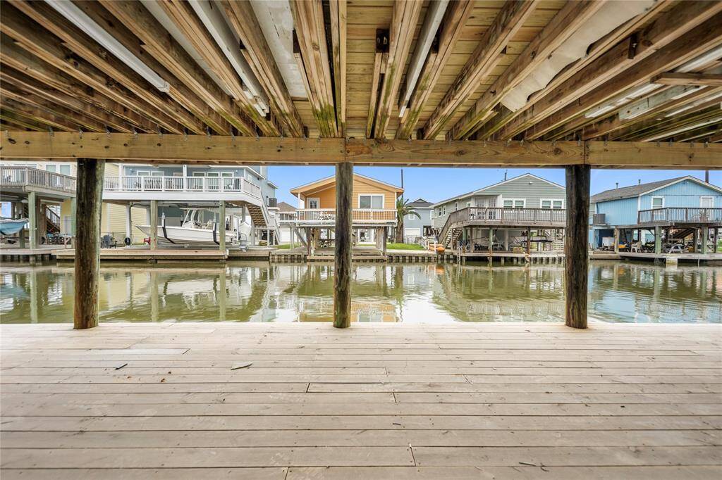Welcome to your slice of paradise! This charming canal-front home invites you in with its tropical vibe, welcoming balcony, and waterfront living  awaits.