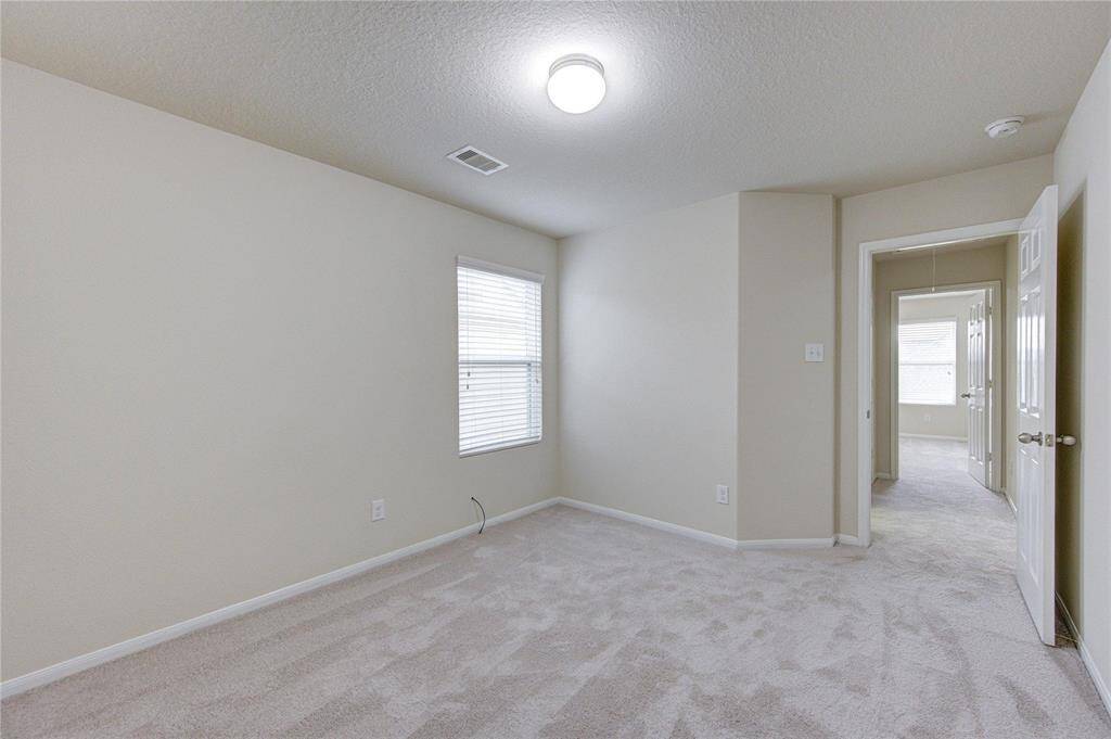 The primary bedroom will easily accommodate a large king size bedroom set with room to spare!