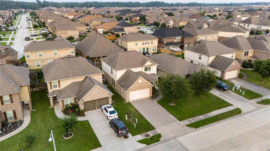 In addition to the 2 car garage, the long driveway can accommodate 4 additional cars for large families or visitors!