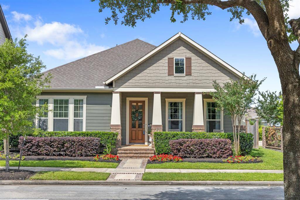 This is a charming single-story home with a fascinating front porch and beautifully landscaped yard. Features classic craftsman-style details and great curb appeal.