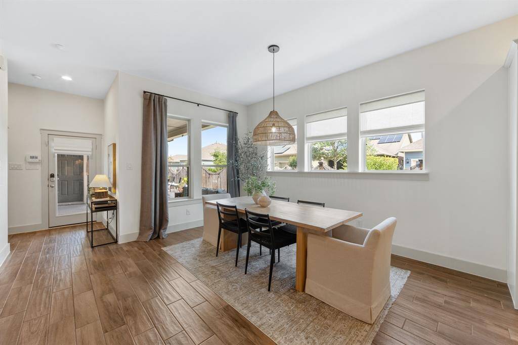 Positioned to overlook the patio/pool by nearby windows, this cozy corner combines elegance with comfort a perfect place for relaxation with family/friends and having a good time any time of day!