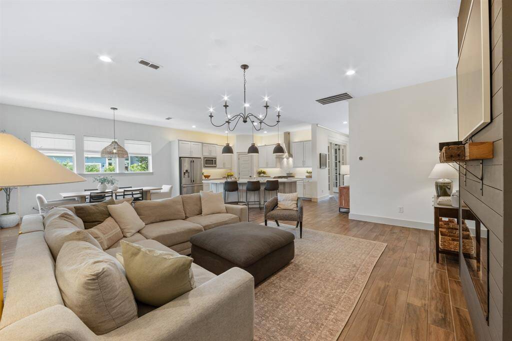 Ample natural light fills the space, enhancing the airy, modern feel and creating a welcoming atmosphere.
